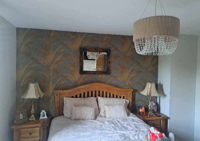 Bedroom feature wall wallpaper and paint